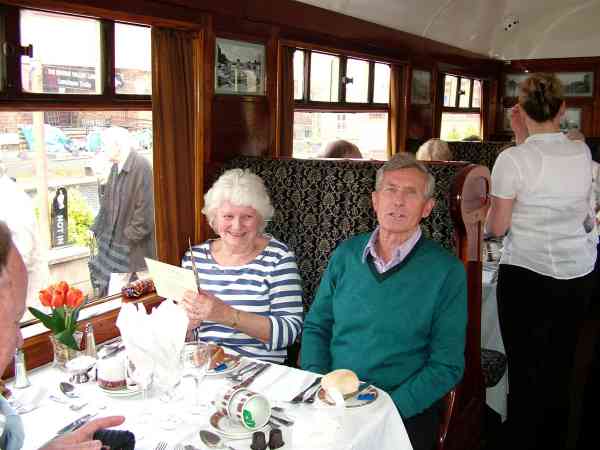Man sitting in a railway carriage.