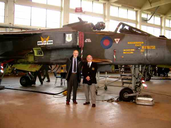 Andy and Mothballs. two men in front of an aircraft.