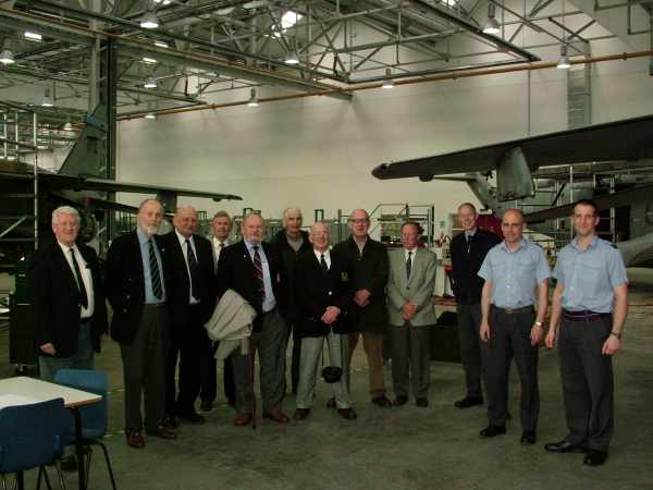 The 74th ready to leave after a visit to RAF Cosford. A group of men standing in an office.