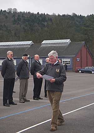 A group of seventy year olds marching on a parade ground