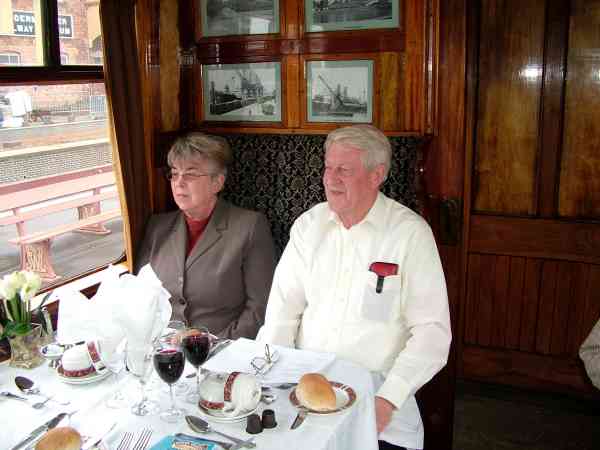 Man sitting in a railway carriage.